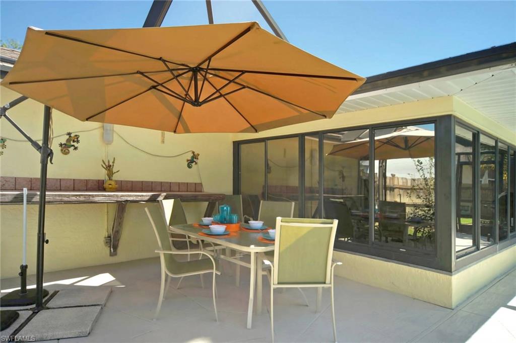 View of patio featuring outdoor dining area