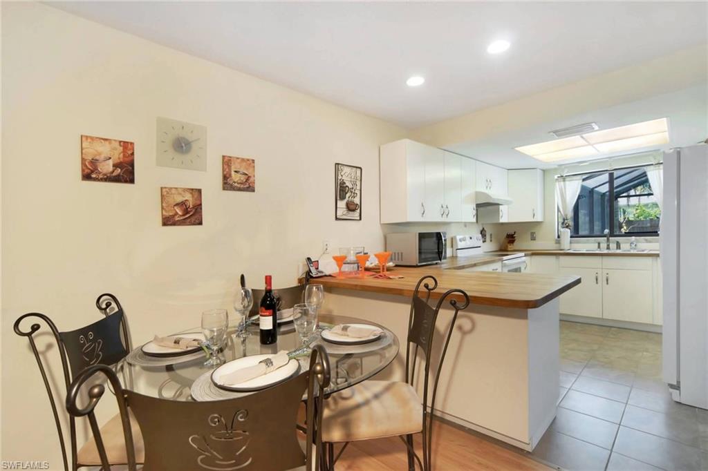 Kitchen featuring nook seating for 4
