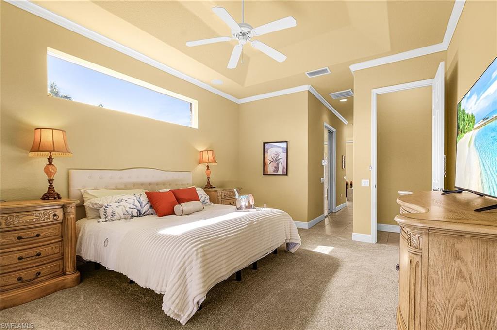 Primary Bedroom with King size bed and flatscreen tv