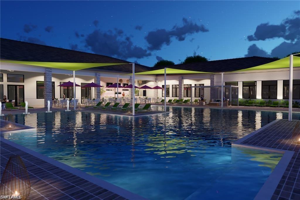 Outdoor resort pool with cabanas