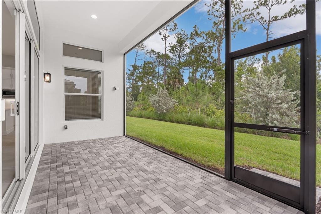 Screened outdoor living space featuring  wall-mounted lighting fixtures, recessed ceiling lighting.