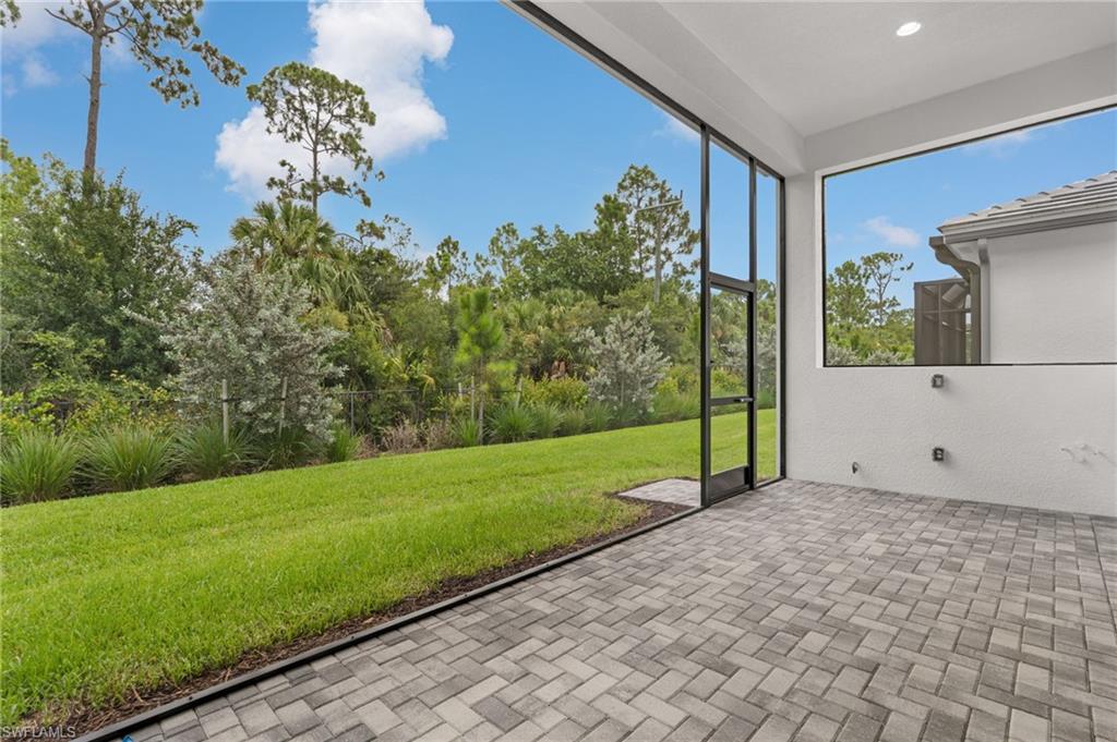Screened private lanai featuring pre-plumbing for outdoor kitchen.