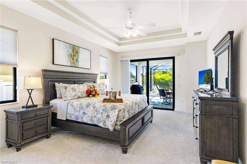 Primary Bedroom w/ pool view
