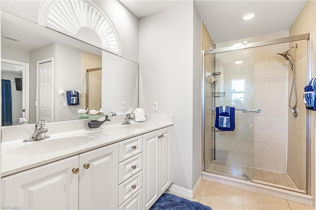 Primary Bathroom  w/ walk in glass shower
