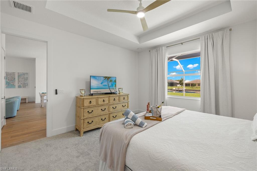 Primary Bedroom w/ Flatscreen TV