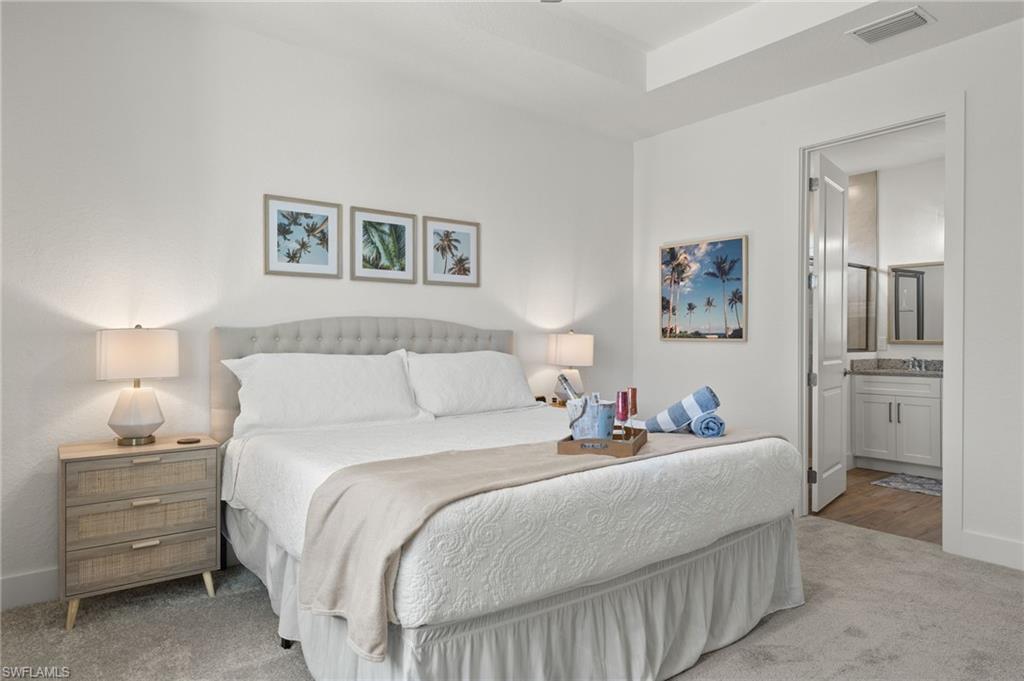 Primary Bedroom w/ adjoining bathroom