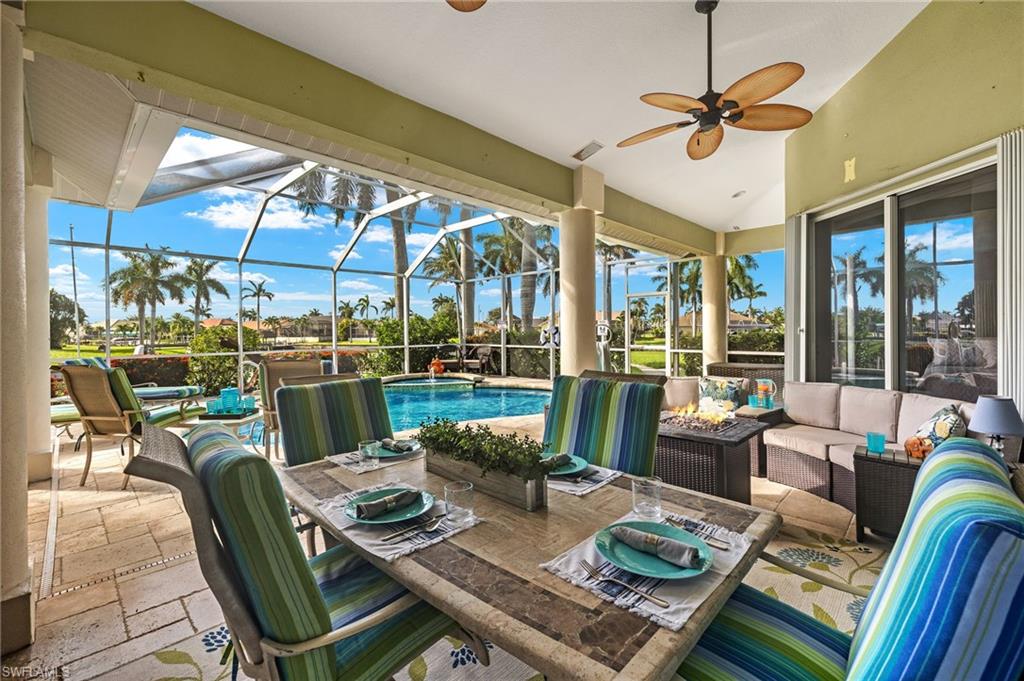 Sunroom featuring ceiling fan and TV ceiling