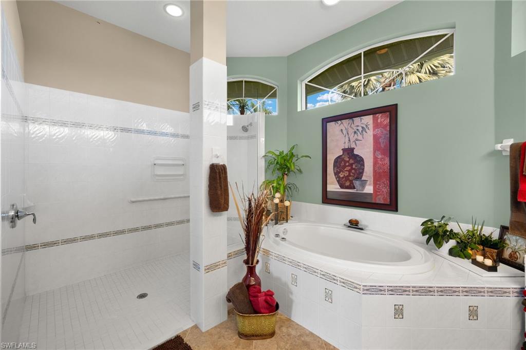 Spacious bathroom with separate shower and soaking tub