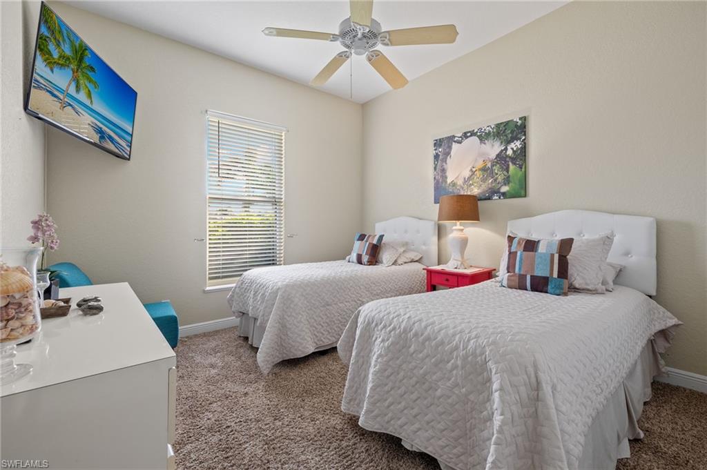 Bedroom featuring carpet flooring and ceiling fan