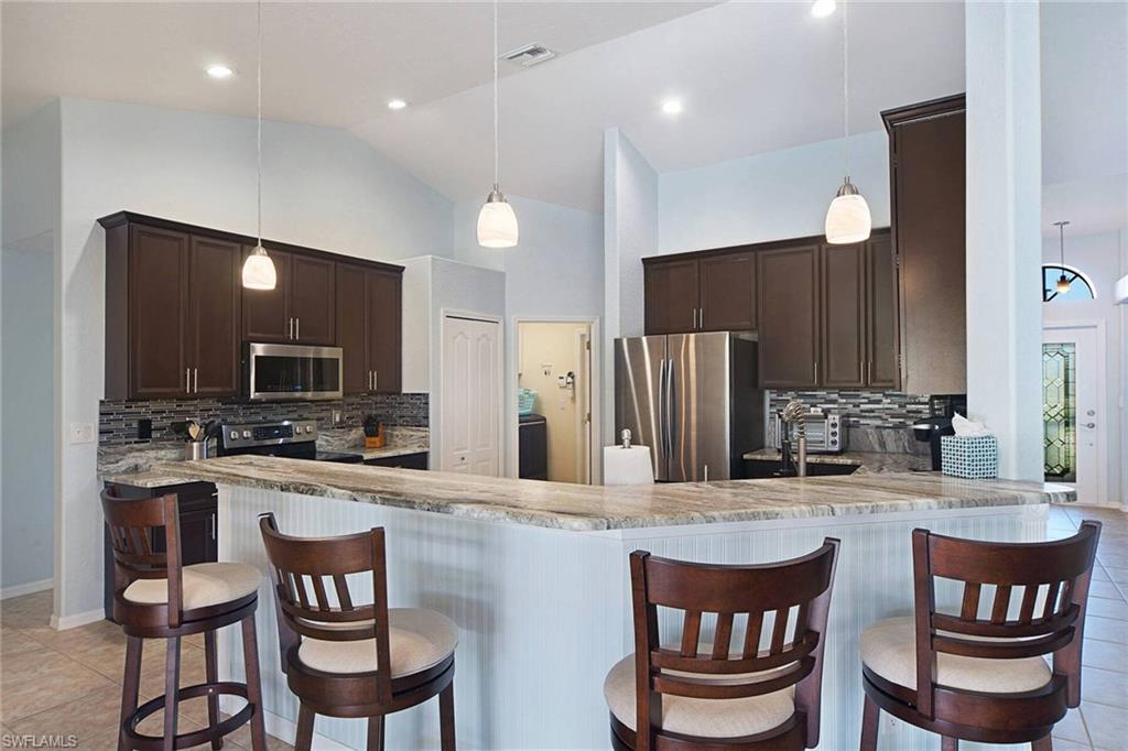 Kitchen w/ bar area