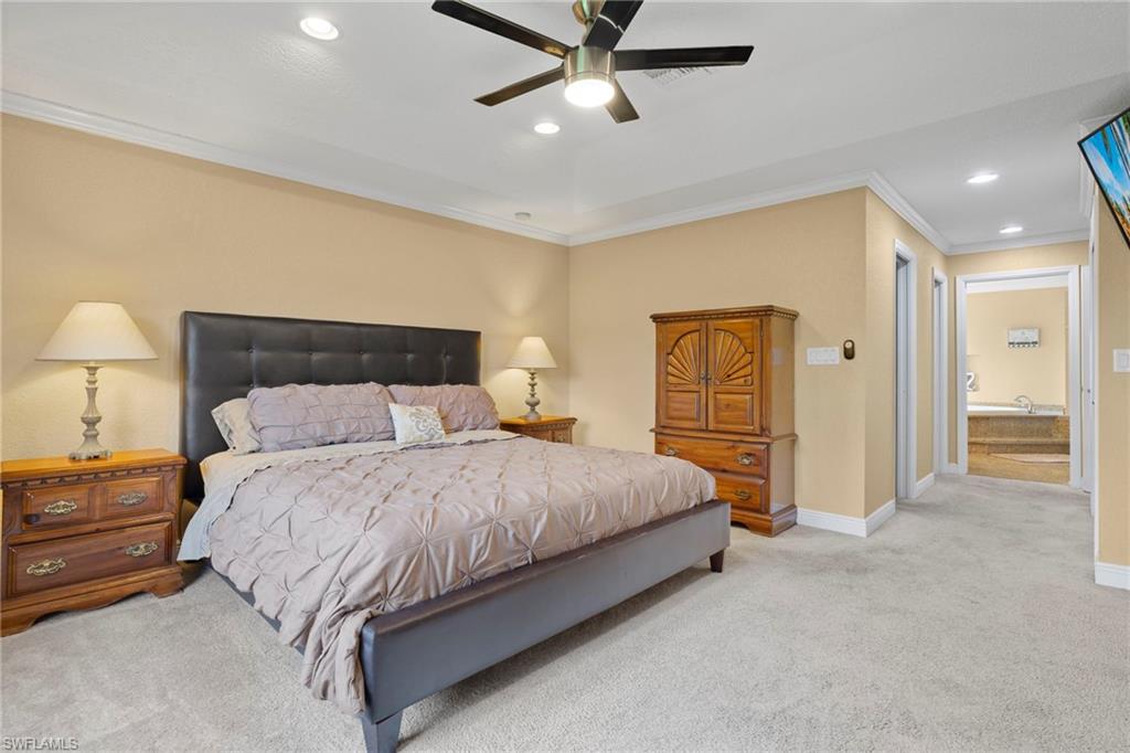 Primary bedroom w/ adjoining bathroom