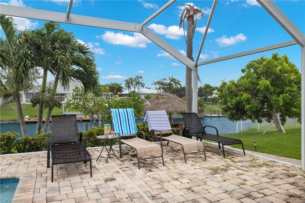 View of patio / terrace with a water view