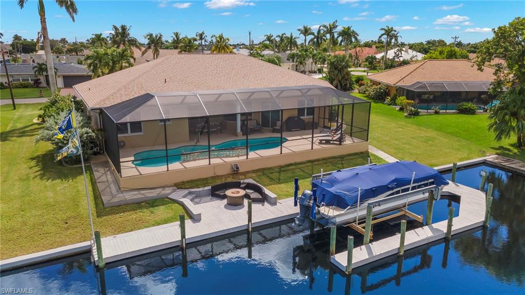 Aerial View of house, Fire Pit seating area & Lift