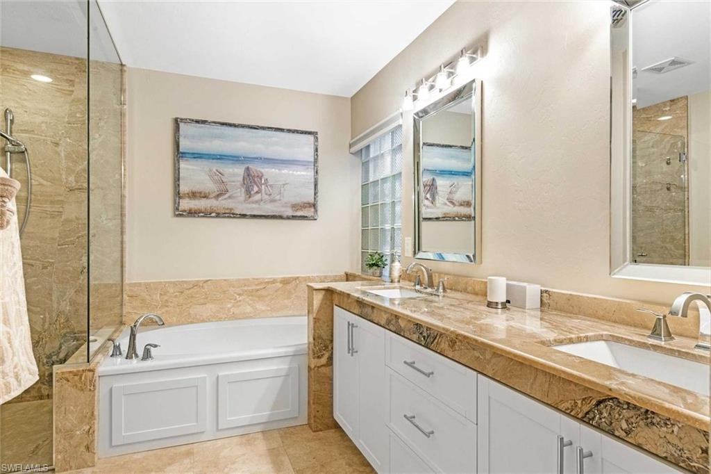 Primary Bathroom w/ Soaking Tub & Dual Vanity