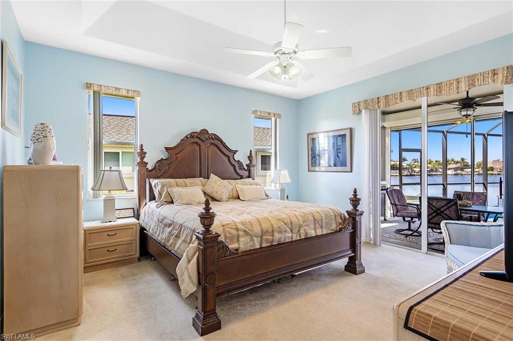 Primary Bedroom with slider to pool