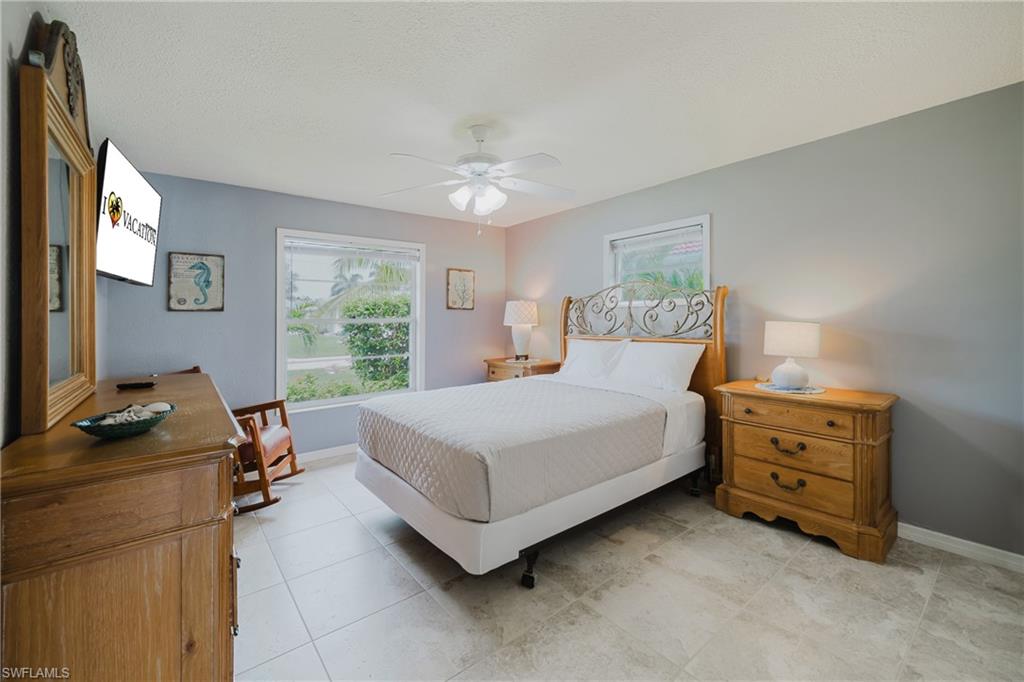 Guest Bedroom with Queen size bed and flatscreen tv