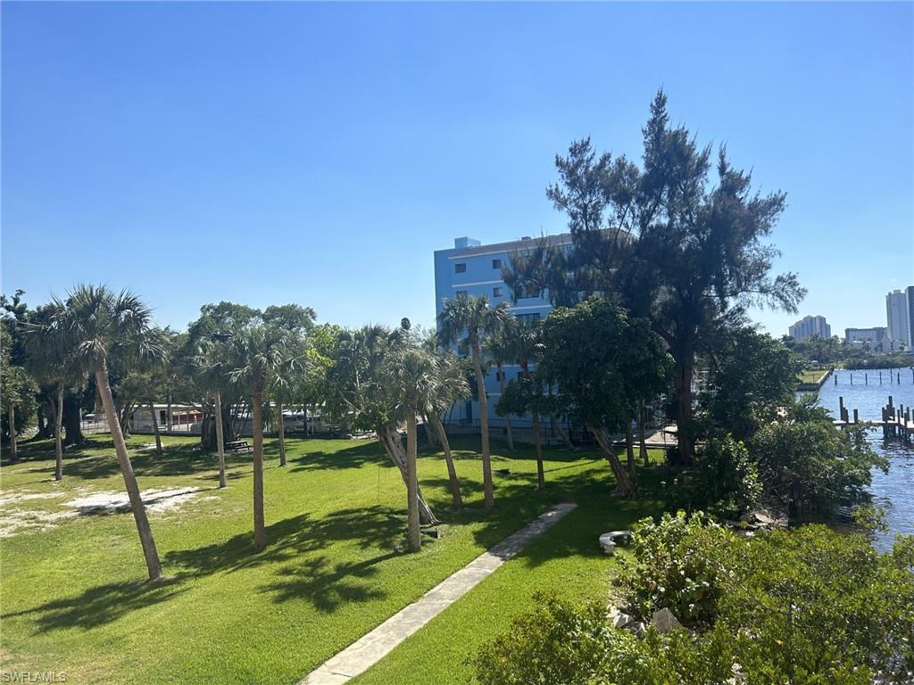 green space of complex provides some grills dog walk the river frontage with riprock.
