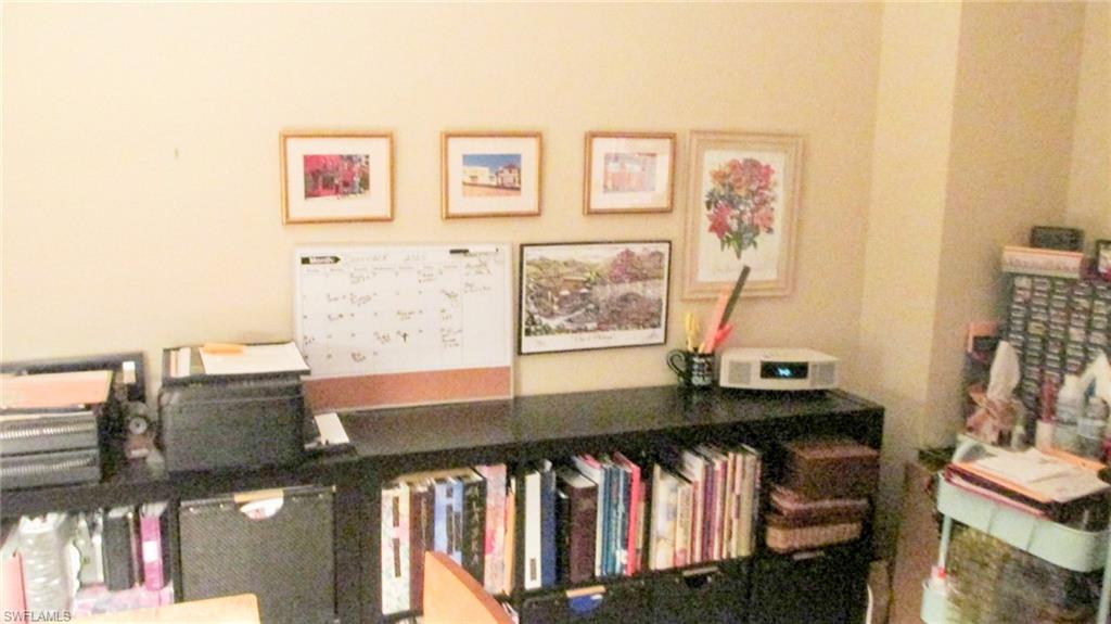 Front Located bedroom used  as office by current tenant. Window facing pool and river plus Glass door direct access to Lanai