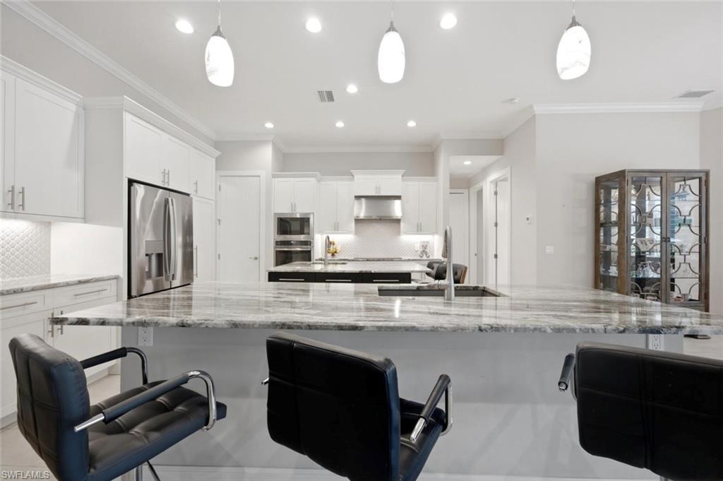 to the kitchen with ample seating