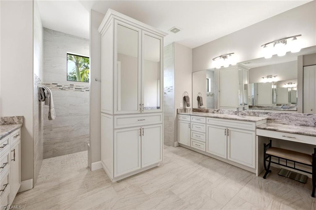 Primary bath with walk in shower & vanity