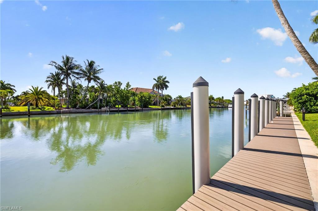 Composite decking boardwalk with multiple pilings