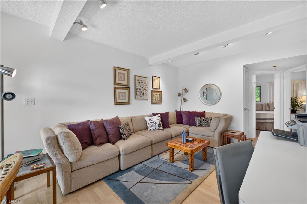 Living area featuring overhead track lighting