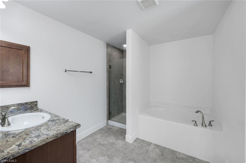 Shower and Tub in Primary