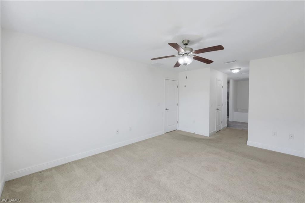 Hallway to dual closets