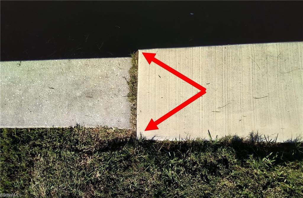 New upgraded hurricane code seawall with larger cement cap.