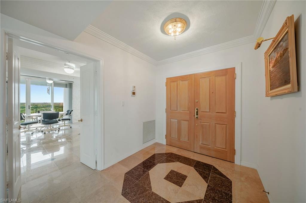 Double door entryway & marble floors