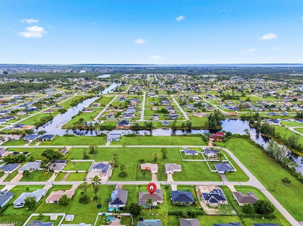 Aerial view showcasing a residential area characterized by numerous canals and waterways