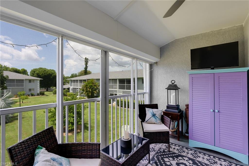 Screened Patio with electric hurricane shutter