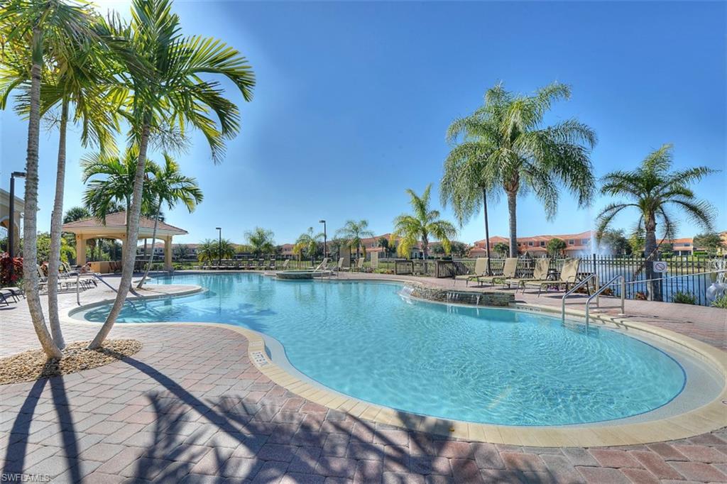 Community pool featuring a patio and a gazebo
