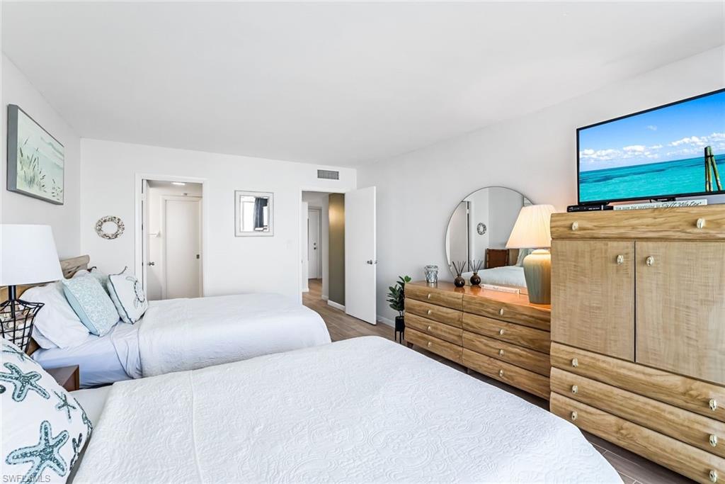 Bedroom with two full-sized beds.