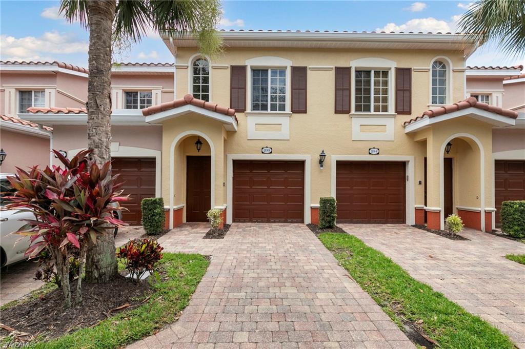 Block paver driveway to the garage enters directly into the home.