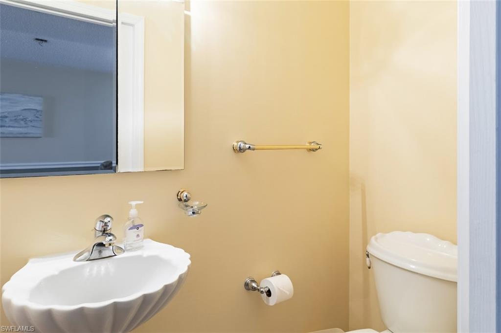 Bathroom with a sink and toilet