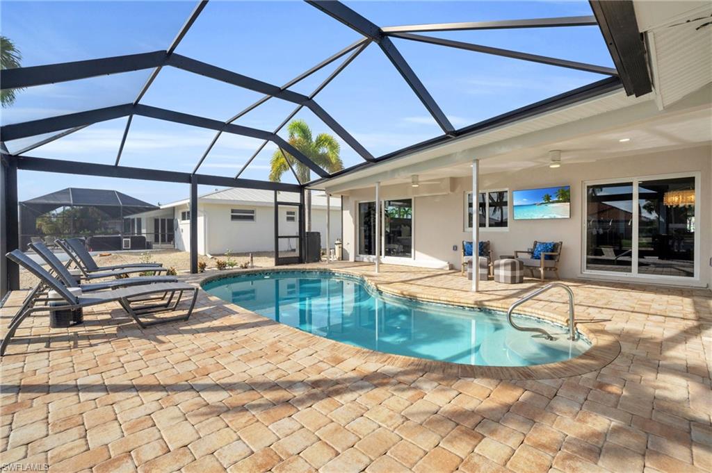 Roomy Caged Pool/Lanai area. Plenty of room for the pool party!