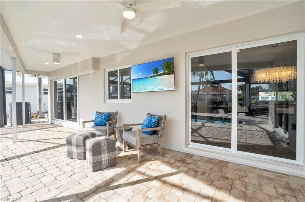 Pool/Lanai area, set up for entertaining with Hurricane Impact slider access