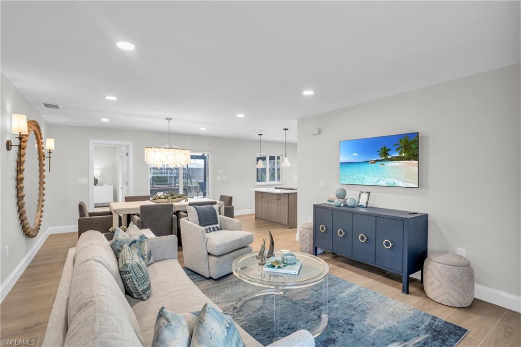 Can you smell the freshness?!  Totally refreshed from the studs out.  Kitchen Island, entertaining dining area and the spacious family area.....all included