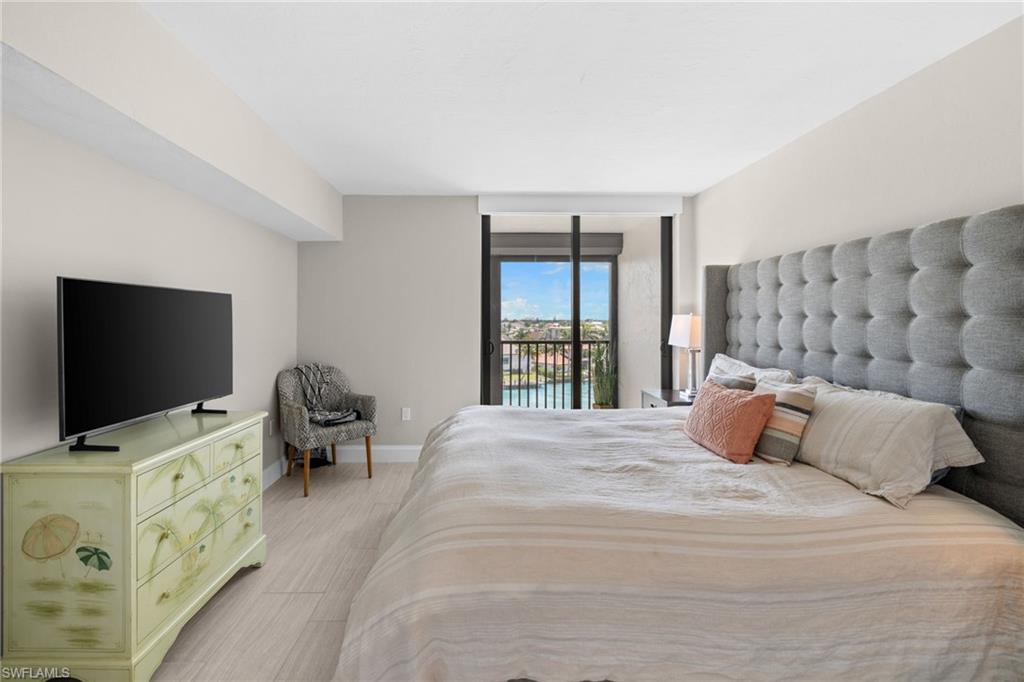 Light wood-finish flooring complements the neutral wall tones