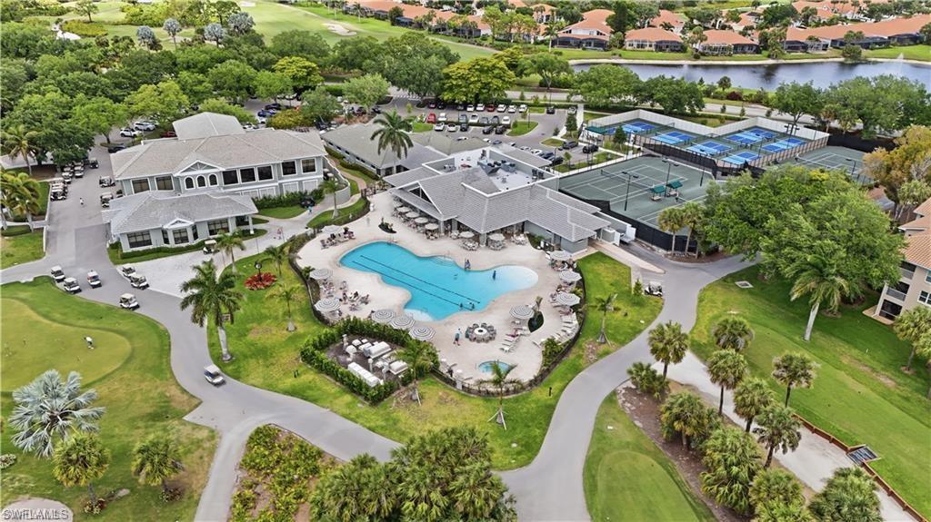Community amenities featuring a clubhouse, large pool area, tennis courts, and golf course access