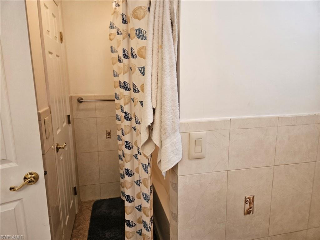 Bathroom with tile walls