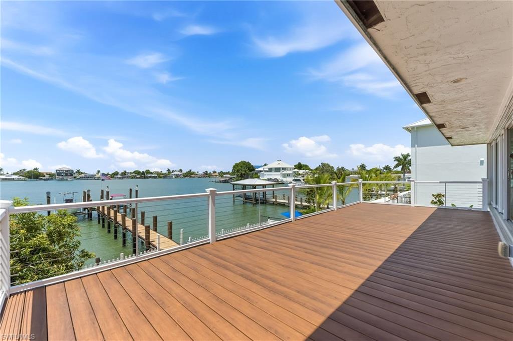 Entertaining deck off living room and primary bedroom