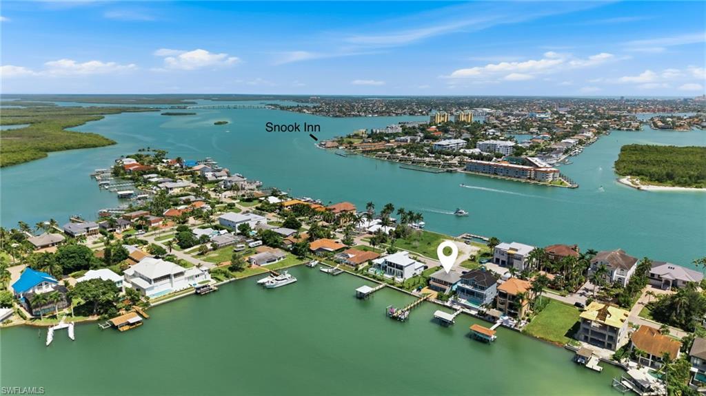 Take a quick boat ride over to Snook Inn or continue under the bridge and out to Goodland Island for some island music and food!