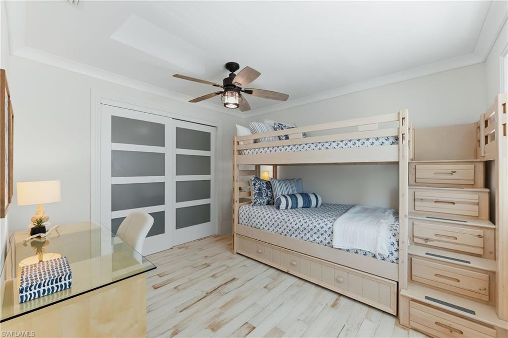 Guest bedroom with trundle under bunk beds