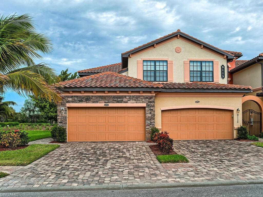 Mediterranean / spanish house featuring a garage