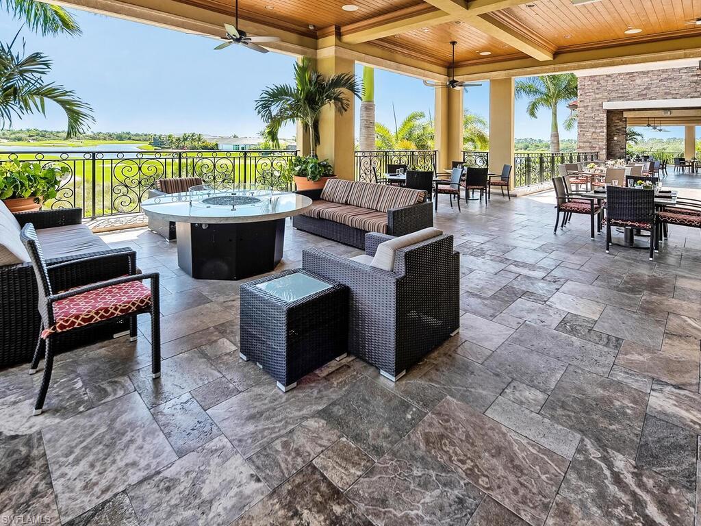 View of patio featuring ceiling fan and an outdoor hangout area