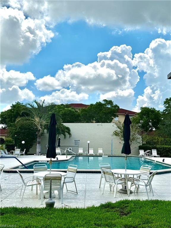 Community heated pool with expansive pool deck