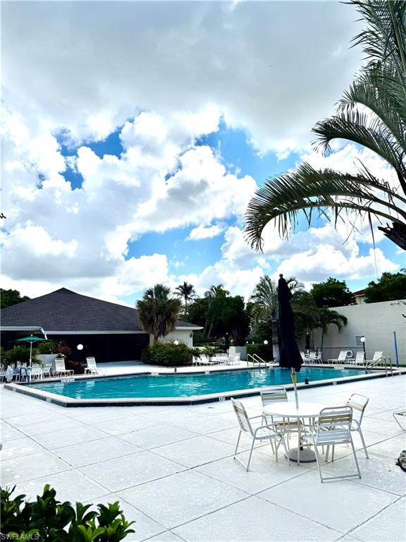 Community heated pool with expansive pool deck