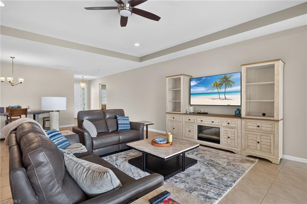 Tray ceiling with recessed lighting and a ceiling fan